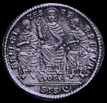 Coin of Constantine I, making a benediction gesture, with his sons, enthroned.